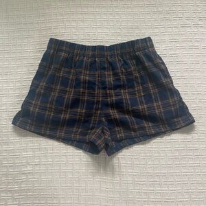 SHEIN navy plaid shorts.